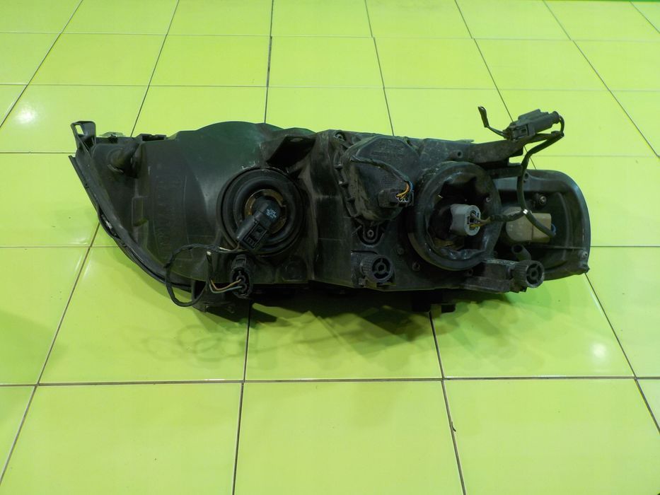 BMW X5 E53 3.0 B 03r SUV 5D lampa lewa przod