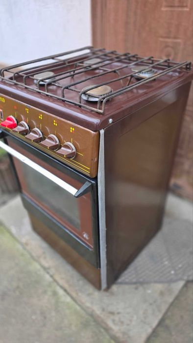 Плита газовая "Электа" 4-х камфорная. коричневая рабочая !