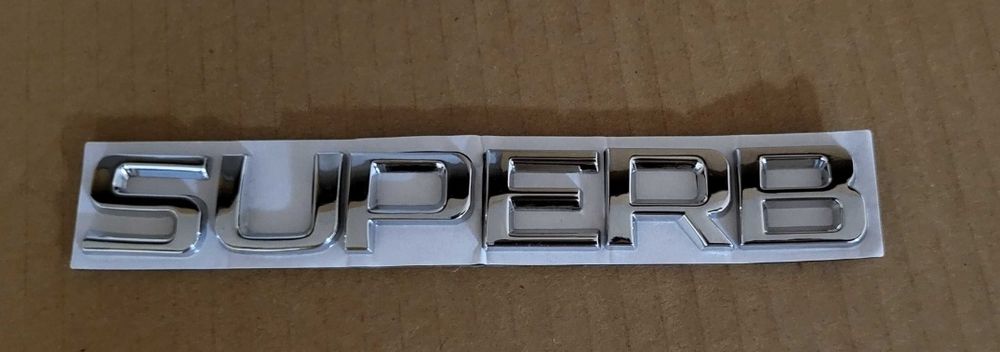 Nowy emblemat SUPERB znaczek przyklejany srebrny logo srebrne Skoda