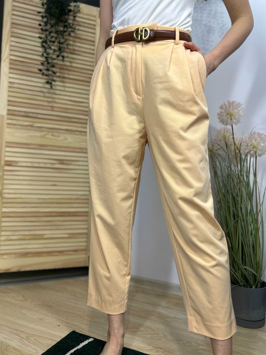 Brzoskwiniowe damskie eleganckie spodnie wysoki stan H&M – rozmiar 38