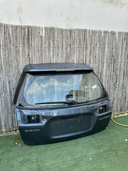 Tampa da mala Subaru Legacy IV