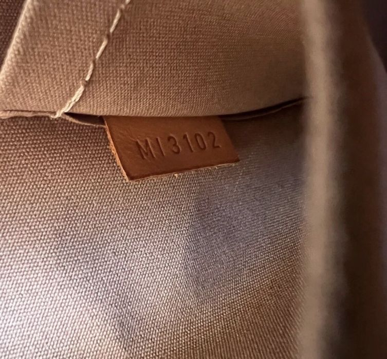 Mala  bolsa Louis Vuitton Alma PM dourada