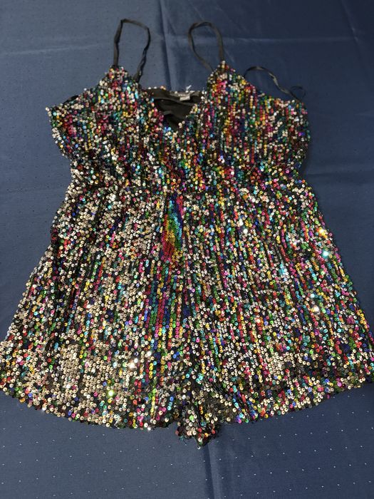 Комбінезон  в паєтках 16 розмір