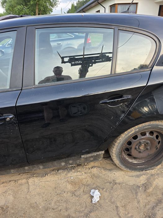 Lewe tylne drzwi bmw e87  668