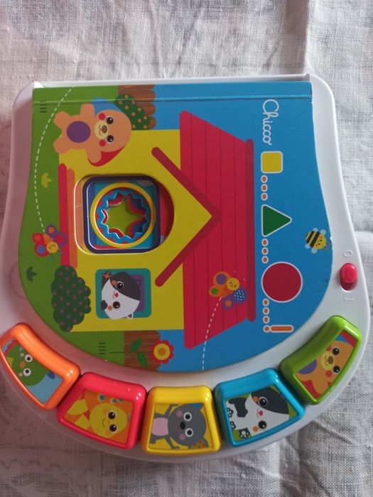Livro/Brinquedo (Chicco) didático para bébé.