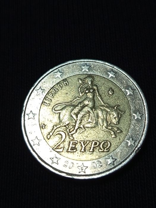Moeda 2 euros com " s " na estrela