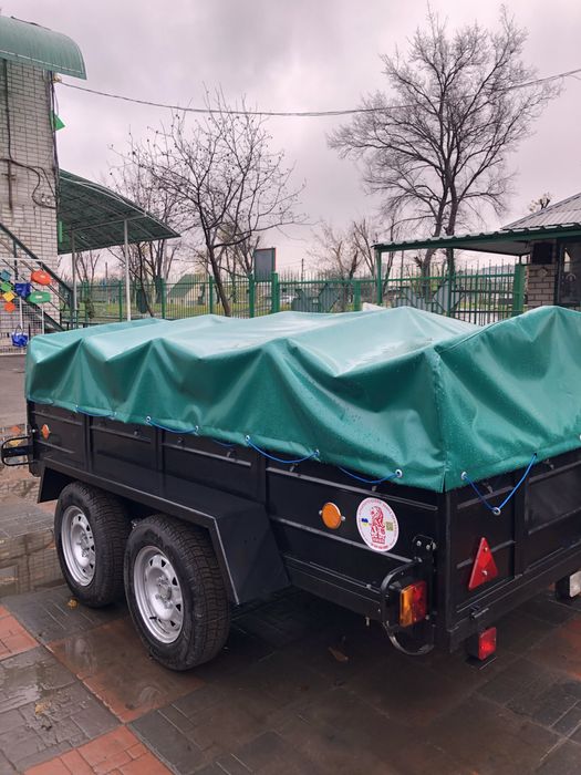 Двухосный черно-синий прицеп 250-140.Двовісний причеп