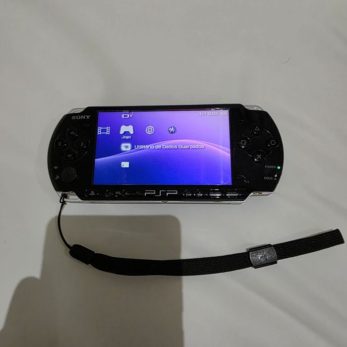 PSP 3004 32Gb (EMU Games) + Carregador Originall

Original