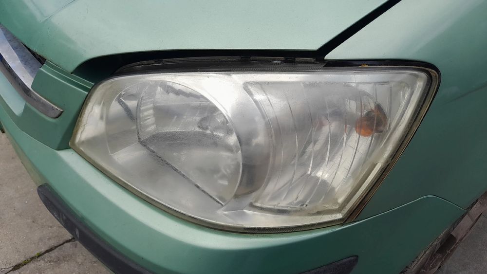 Ótica / farol esquerda HYUNDAI Getz (TB)