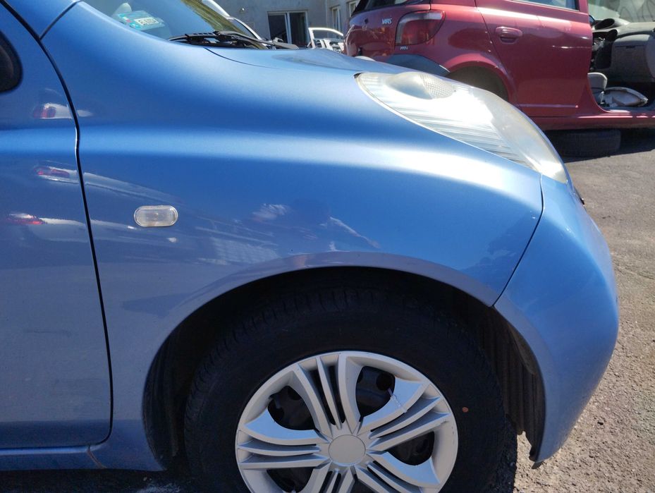 Nissan Micra K12 1.2i 3D 2003r.Błotnik przedni prawy.