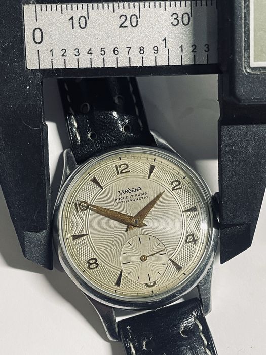 Relogio jardena corda manual