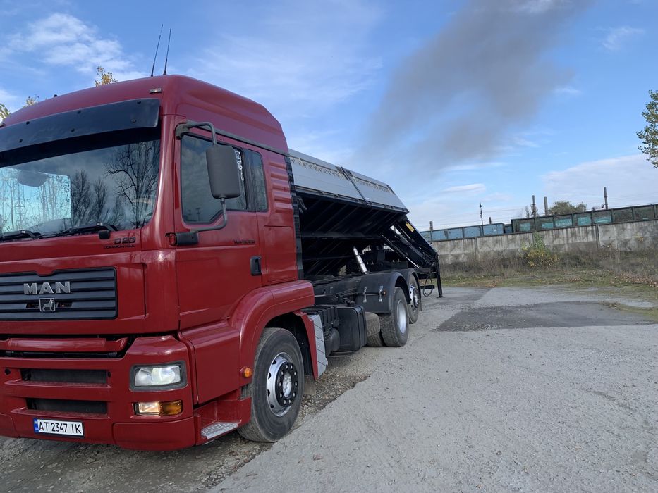 Ман самоскид з маніпулятором