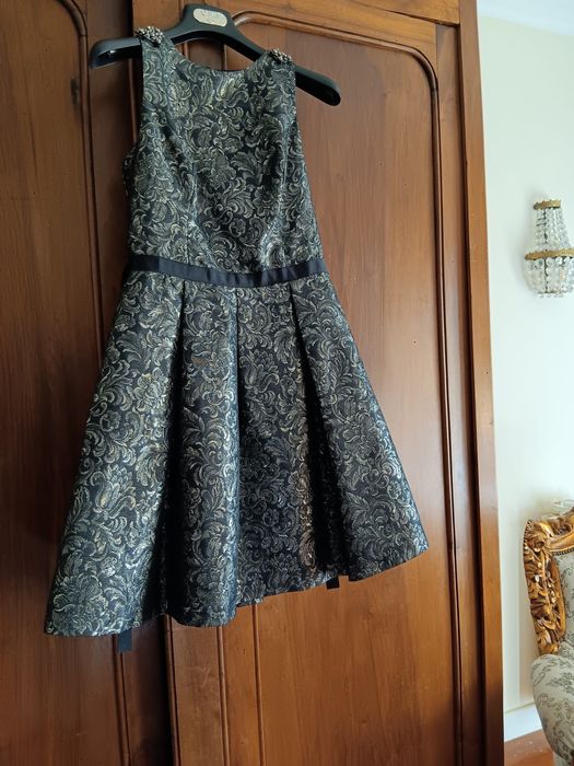 Elegante vestido, sofisticado, perfeito para ocasiões especiais.