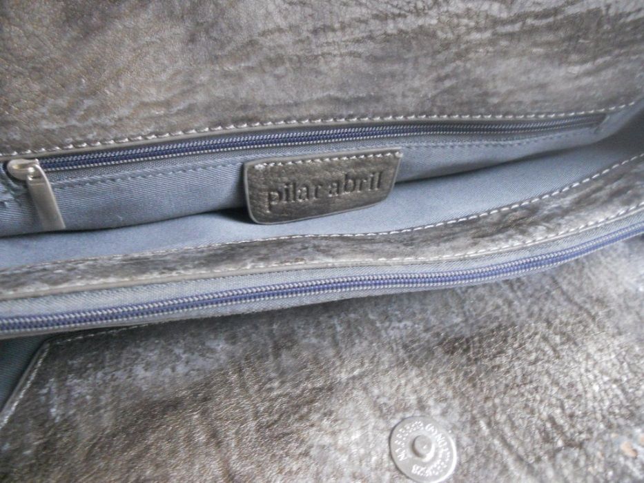 Mala de senhora Pilar Abril