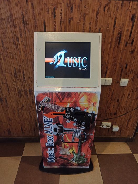 Музичний автомат шарманка термінал