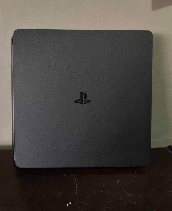 Playstation 4 (PS4) (1TB), como seminova (c/câmara, comandos e jogos)64739695265153121