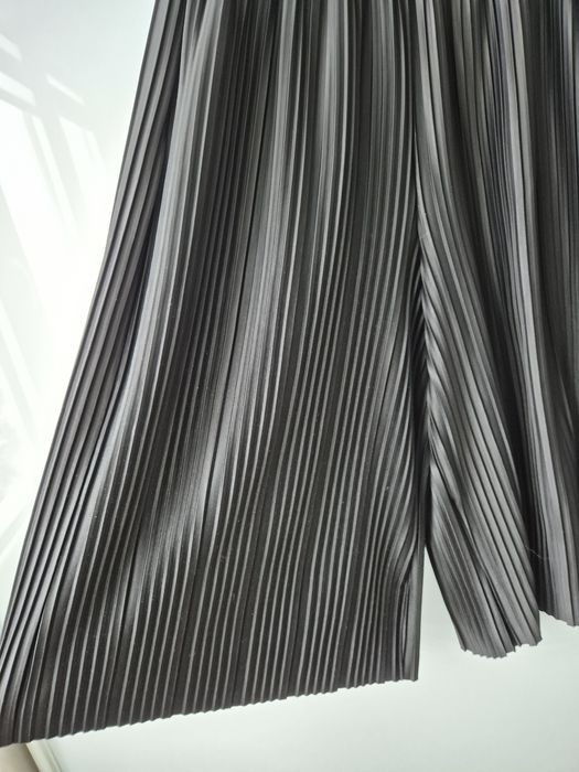 Plisowane spodnie kuloty Reserved 140 używane czarne