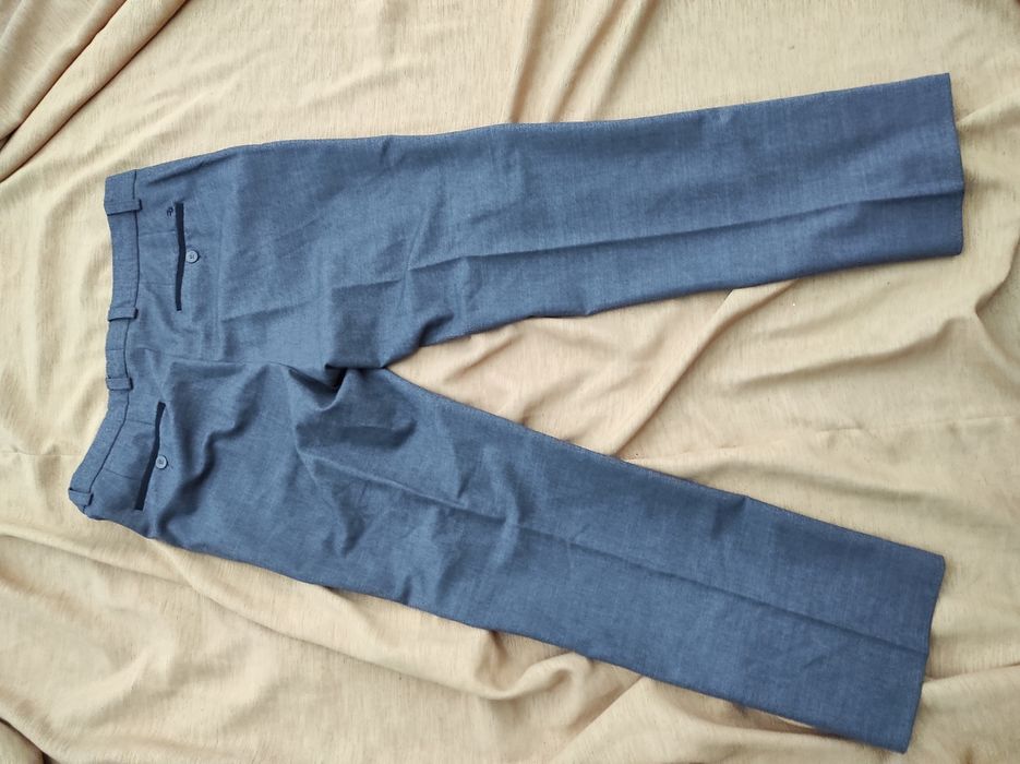 Świetne spodnie garniturowe eleganckie Remus Uomo W34L31 pas 86cm