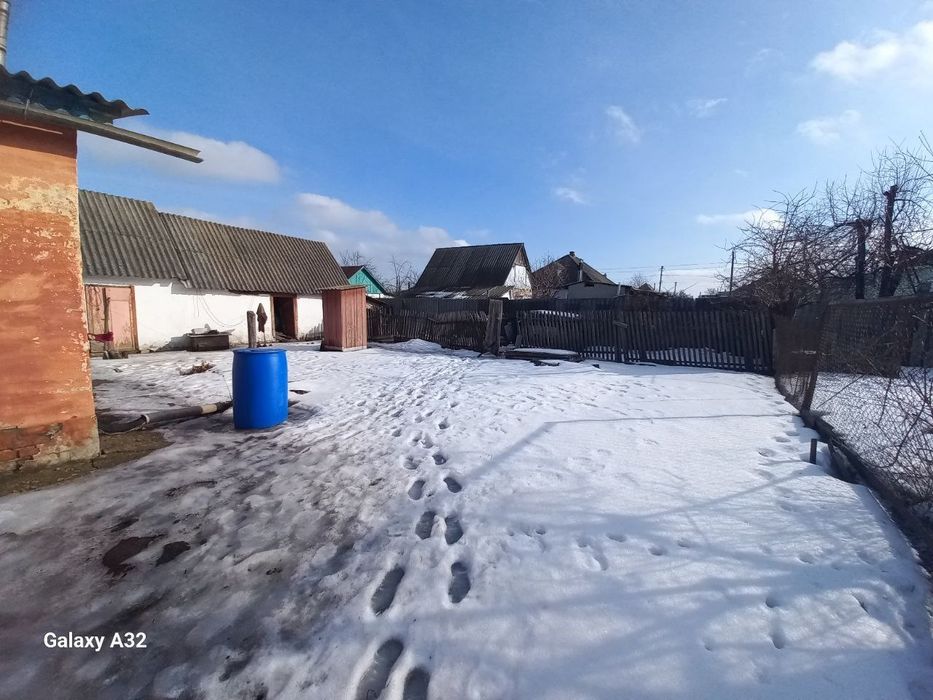 Продається охайний дім в районі пед.коледжу.