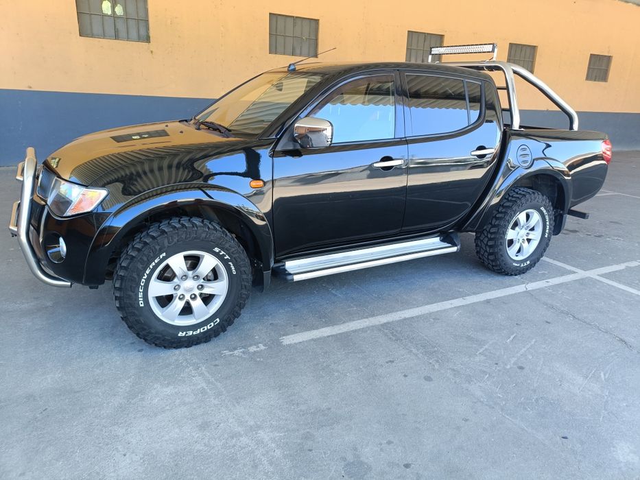Mitsubishi L200 4x4 com 154 mil km reais.