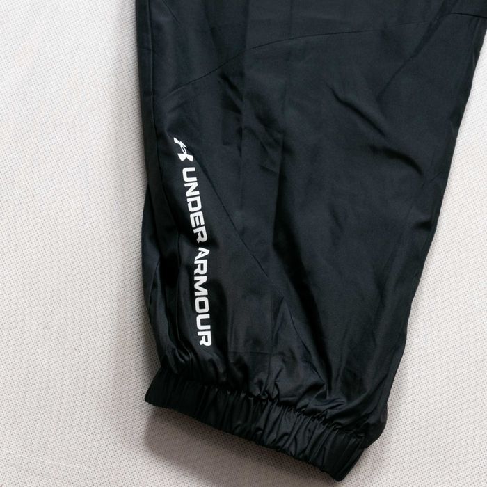 NOWE Under Armour Rush Woven Celliant spodnie treningowe 3/4XL