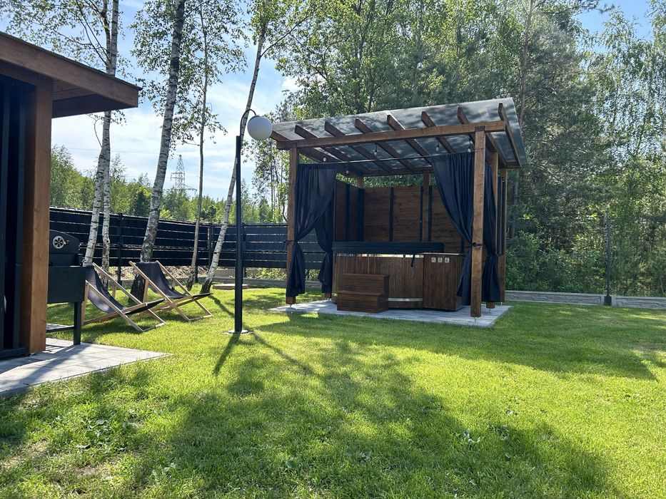 Pod Brzozami-domki całoroczne Balia jacuzzi noclegi Bałtów