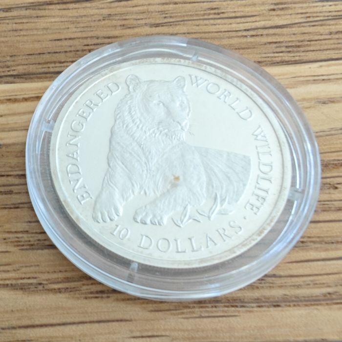 Srebro. 10 dollars 1990  Tygrys. Certyfikat