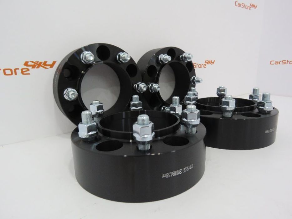 Espaçadores 4x4 50mm Nissan  6x139.7 M12x1.25 Pretos CB 110