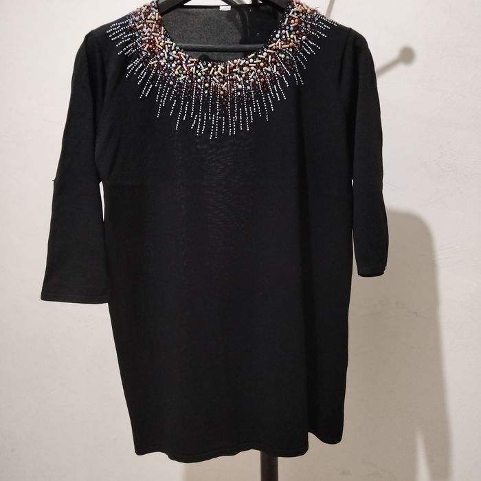 Женская  одежда.