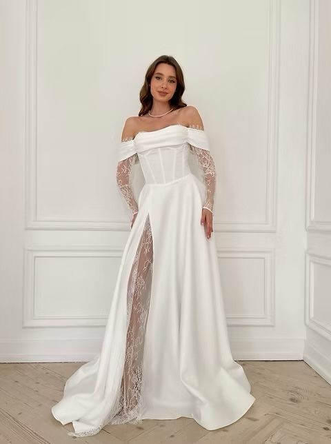 Весільна біла сукня