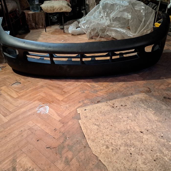 Бампер передній шеврале лачеті