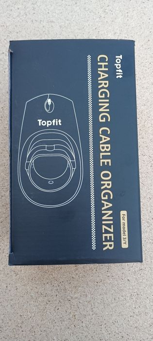 Uchwyt na kabel od ładowarki