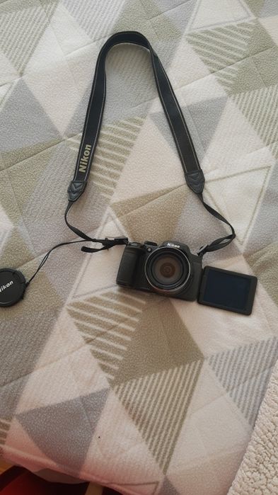 Nikon p520 funcionando, apenas com defeito no obturador.