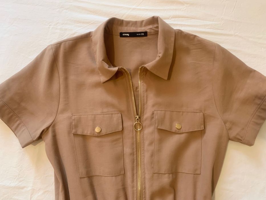 Бежевий комбінезон Sinsay