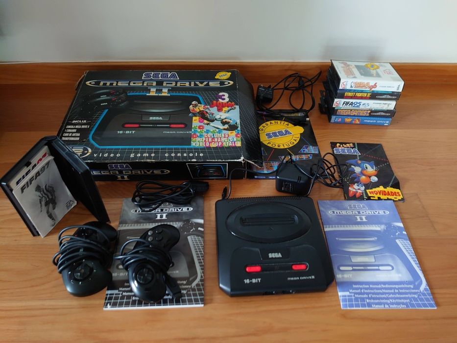 Sega Mega Drive + jogos e caixas