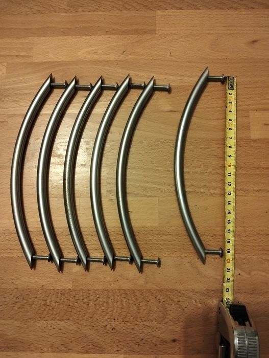 7 Puxadores em metal prateado