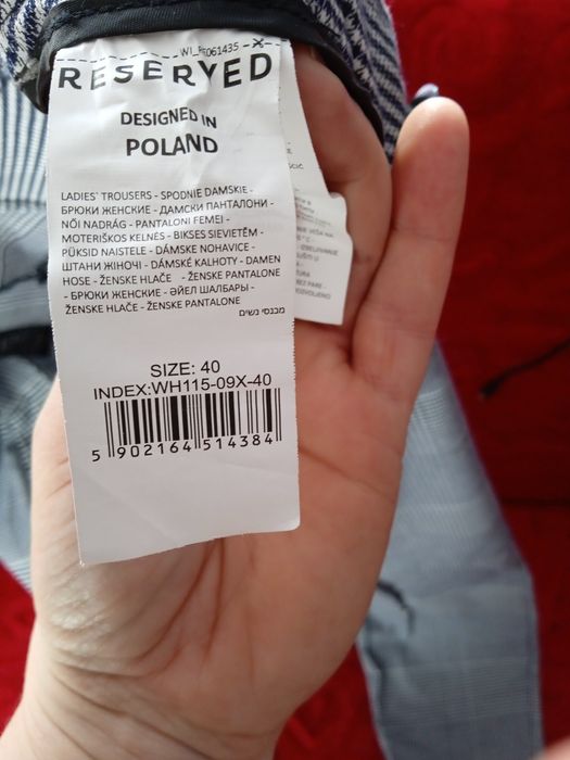 Męskie spodnie w kratę Reserved 40