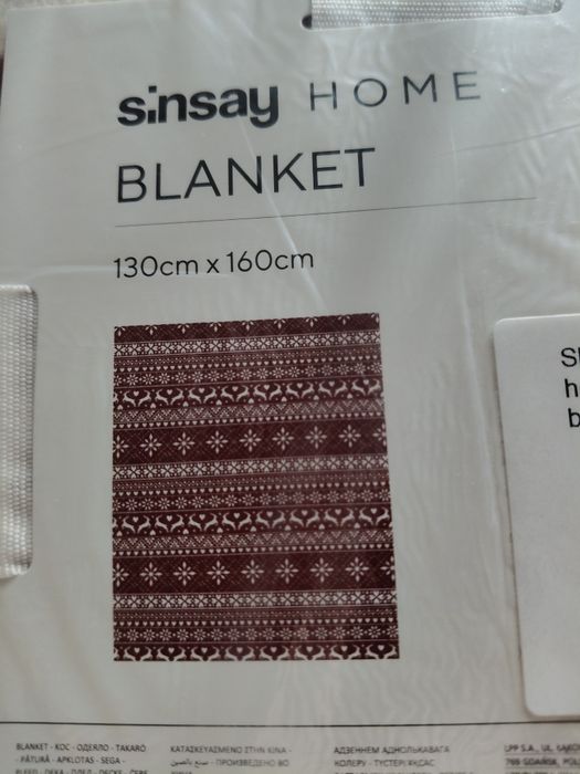 Пледи з різдвяним принтом.