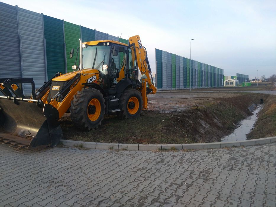 usługi koparko- ładowarka kołowa mini roboty ziemne piasek gruz kucie