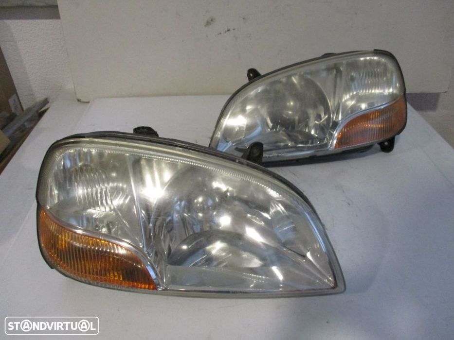 Farol Optica esquerdo / direito Suzuki Swift