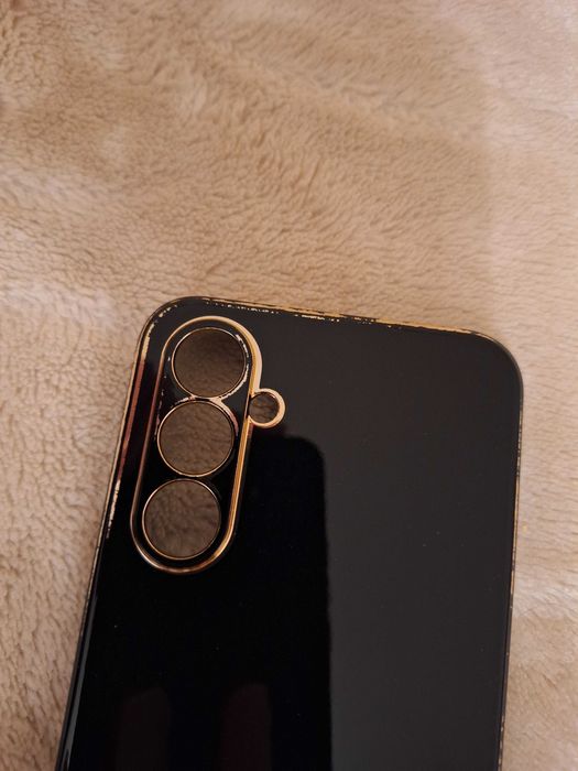 Etui czarne ze złotymi elementami Samsung Galaxy A54