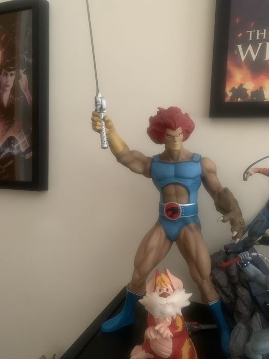 Lion-O e Snarf dos Thundercats