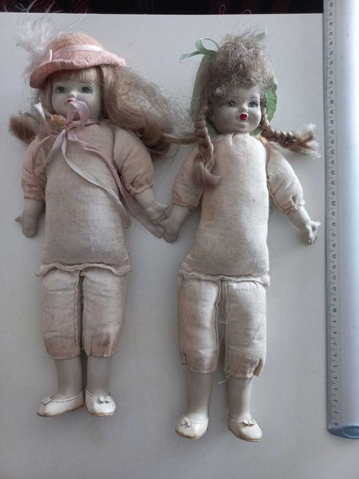 2 bonecas de porcelana
