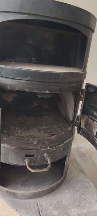 Kominek żeliwny z szamotkami