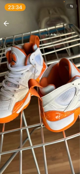 Jordan 14 branco e laranja