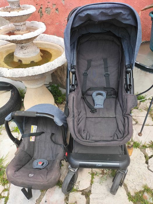 Carrinho de bebe com ovo e malinha