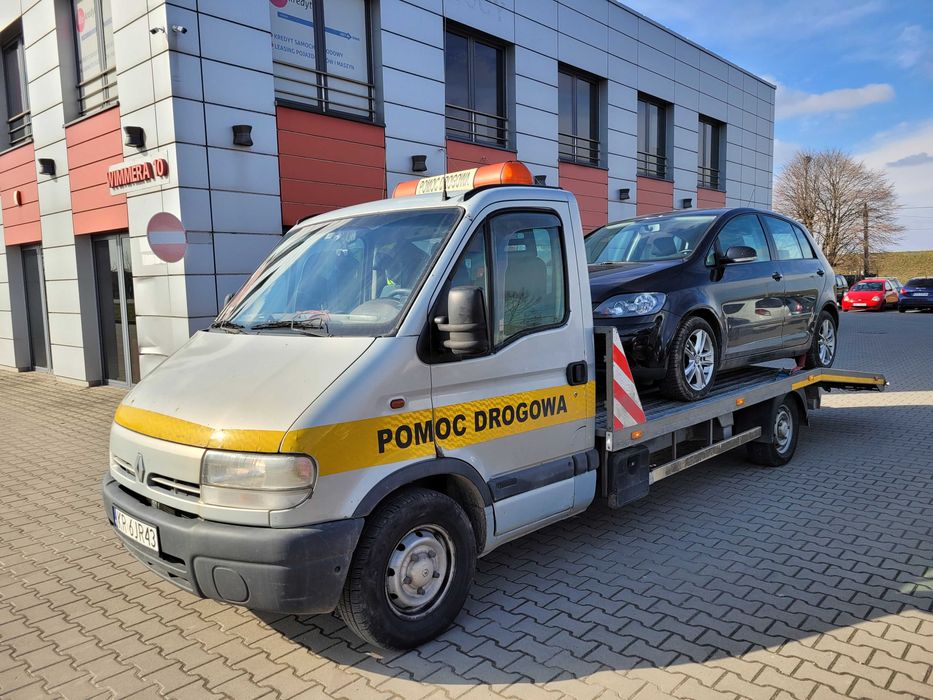 Transport pojazdów na lawecie pomoc drogowa laweta Kraków  Wieliczka A