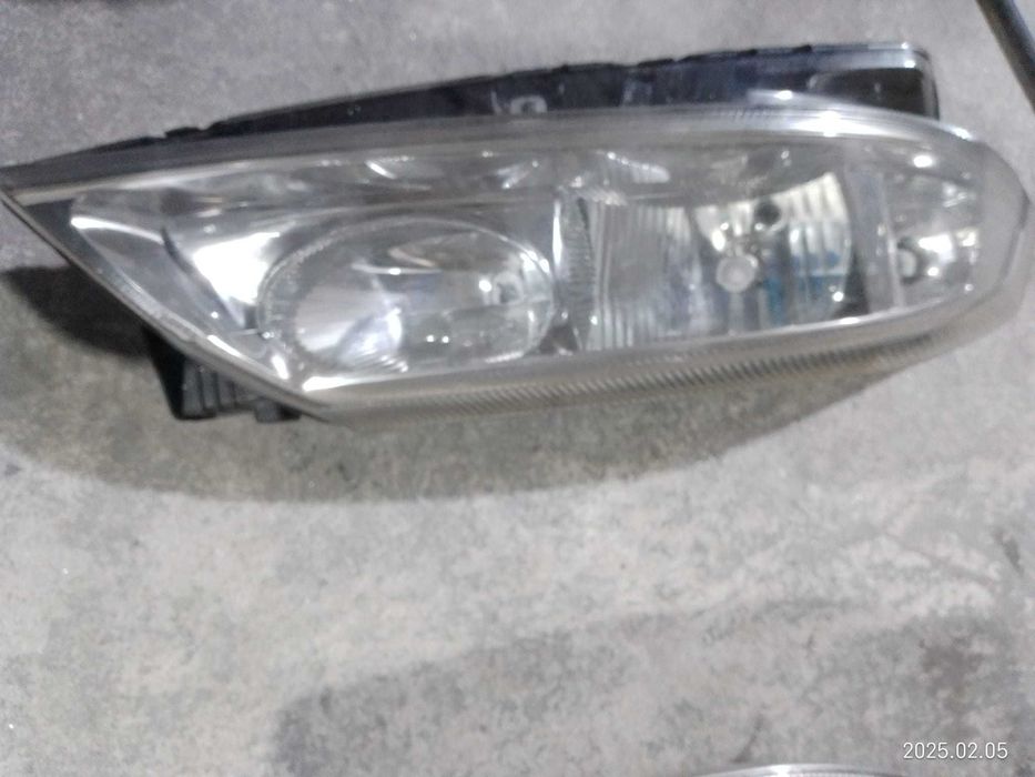 Otica farol drt e esq Renault Laguna II