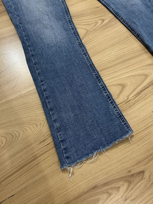 Sprzedam niebieskie dżinsy dzwony z kieszeniami Pull&Bear