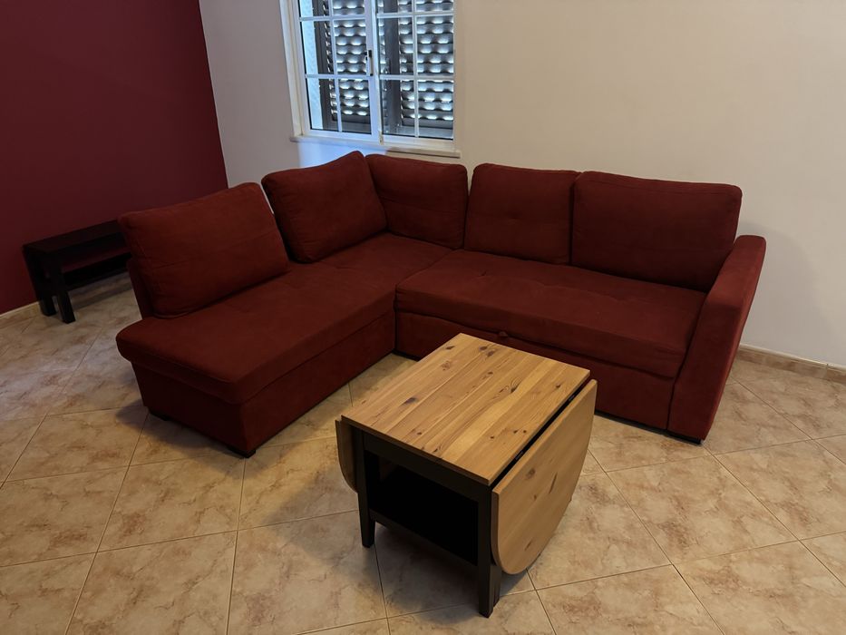 Sofá de canto vermelho